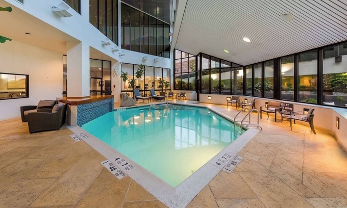 White Plains Hotel | Warm and Comfortable Pets Allowed Two Queen Room w/Pool and Airport Shuttle