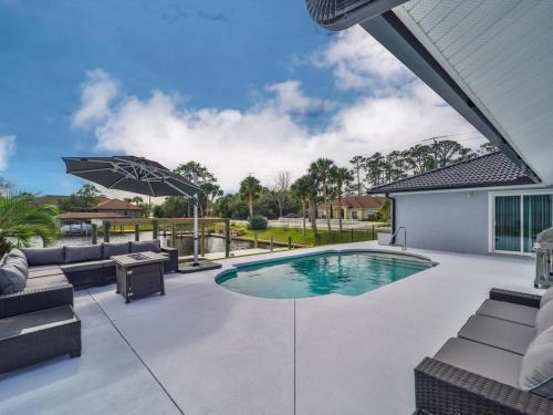 Palm Harbor House | Waterside Paradise with Pool in Palm Coast