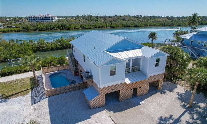 Palm Island House | Welcome to the Tipsy Turtle: Luxury 4 bedroom home with Pool and Private Dock on Palm Island