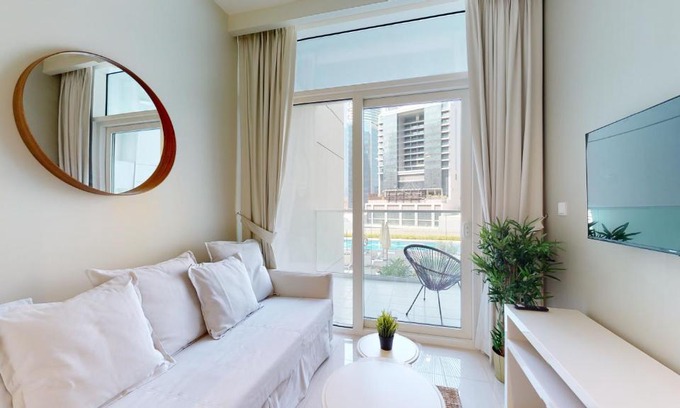 Downtown Dubai Apartment | WelHome - Cozy 1BR With Private Balcony Steps From the Canal