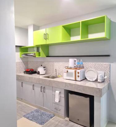 Manoc-Manoc Apartment | White Beachfront Apartment By Anna