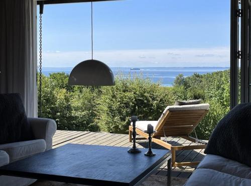 Knebel House | Wooden House By Sletterhage Lighthouse On Helgenæs