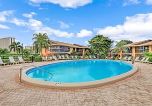 Island-style condo w/ two heated pools & brief walk to beach