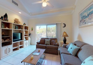 Island condo w/ balcony, shared pool, & hot tub - one block from the beach!