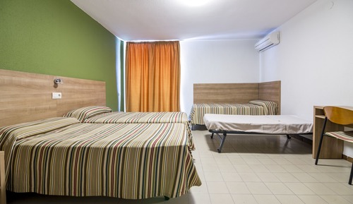 Quadruple Room ( for 2 adults and 2 children)