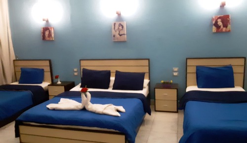 Deluxe Quadruple Room, Balcony, City View