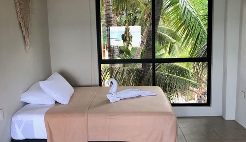 Deluxe Quadruple Room, 2 Queen Beds