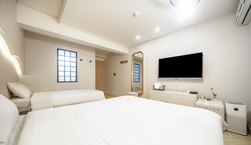 Room (Twin (non-smoking double + single Net)