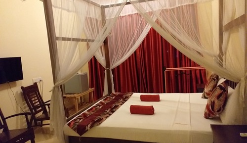 Deluxe Triple Room with Balcony and City View