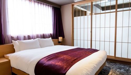 Deluxe Quad Room