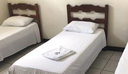 Quarto triplo standard com banheiro compartilhado