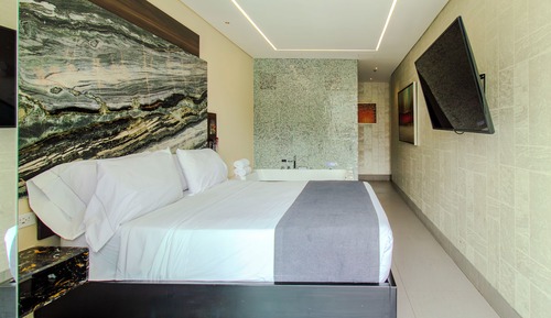 Room with jacuzzi and balcony