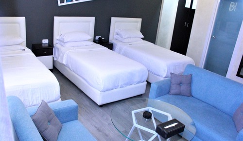 Deluxe Triple Room, 3 Twin Beds, Courtyard View