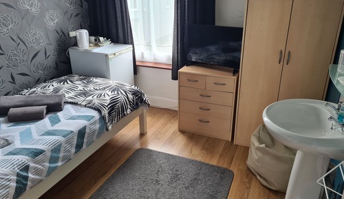 Single Room, Shared Bathroom