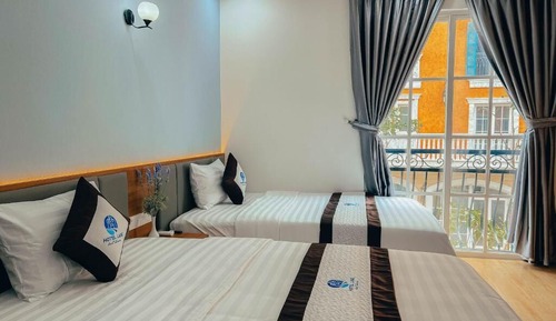 Deluxe Quadruple Room, Balcony, City View