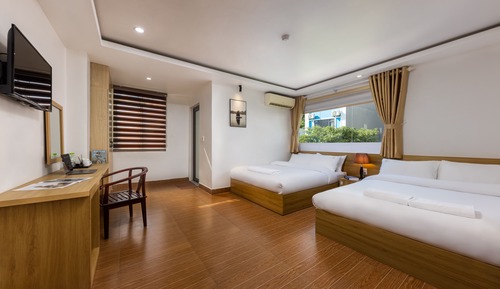 Deluxe Quadruple Room, 2 Queen Beds, City View