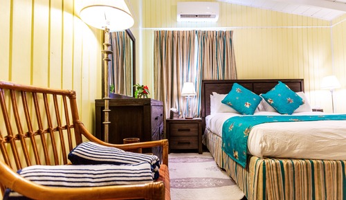 Basic Quadruple Room, 2 Queen Beds, Garden View (Tropical)