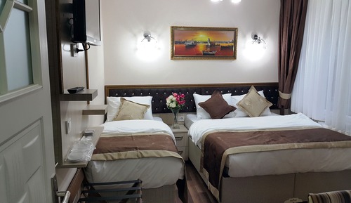 Deluxe Triple Room
