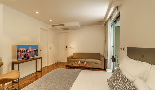 Deluxe Suite, Pool Access, Garden Area