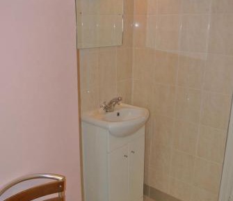 Basic Single Room with Shared Bathroom