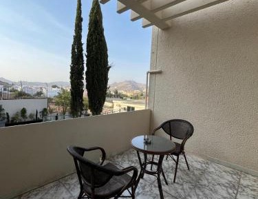 Two-Bedroom Apartment with Balcony