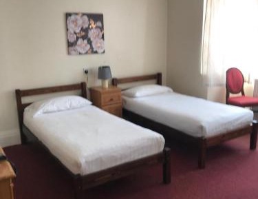 Basic Triple Room with Shared Bathroom
