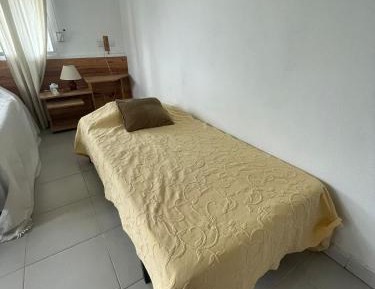 Single Bed in Dormitory Room