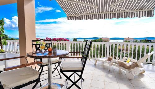 One-Bedroom Apartment with Balcony and Sea View