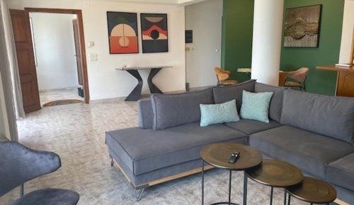 Three-Bedroom Apartment with Sea View