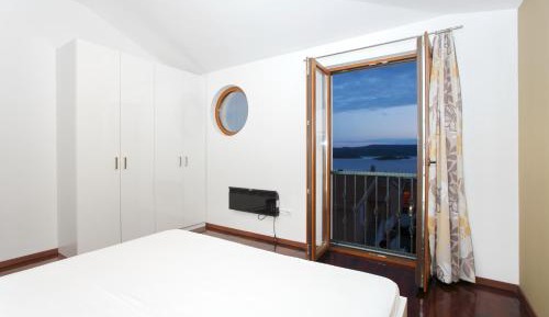 Two-Bedroom Apartment with Balcony and Sea View