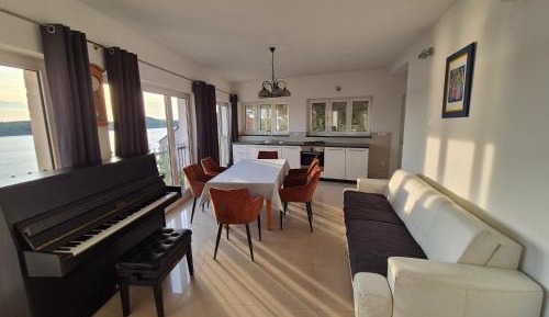 Three-Bedroom Apartment with Sea View