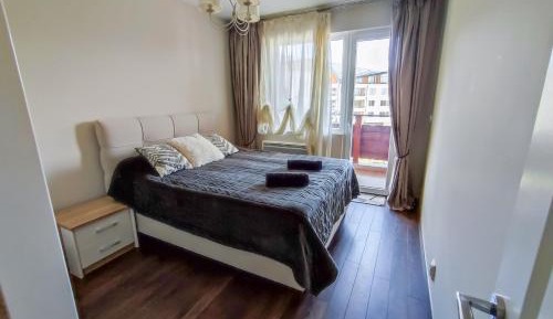 One-Bedroom Apartment with Balcony and Mountain View  