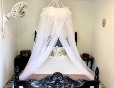 Queen Room with Shared Bathroom