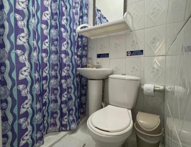 Quadruple Room with Private Bathroom