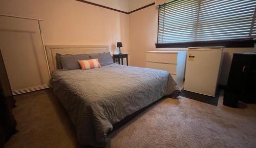 Queen Room with Shared Bathroom