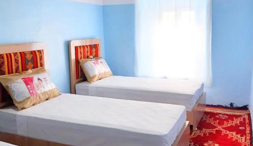 Economy Quadruple Room with Shared Bathroom