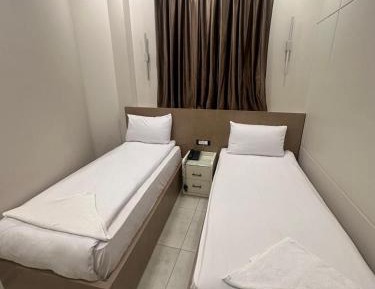 Twin Room with Private Bathroom