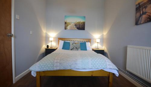 Deluxe One-Bedroom Apartment with Garden View