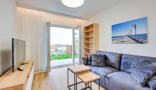 One-Bedroom Apartment with Sea View and Private Garden
