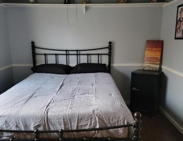 Queen Room with Shared Bathroom