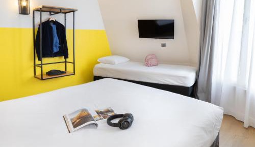 Standard Triple Room with 2 Single Beds and Sofa Bed