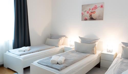 One-Bedroom Apartment with Balcony and City View