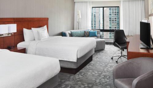 Queen Room with Two Queen Beds with Sofa Bed and Partial City View