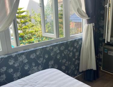Quadruple Room with Private Bathroom