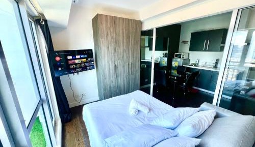 One-Bedroom Apartment with Balcony and City View
