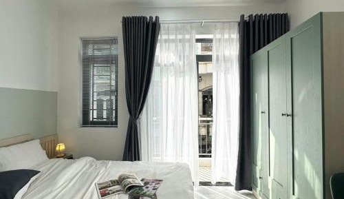 One-Bedroom Apartment with Balcony and City View