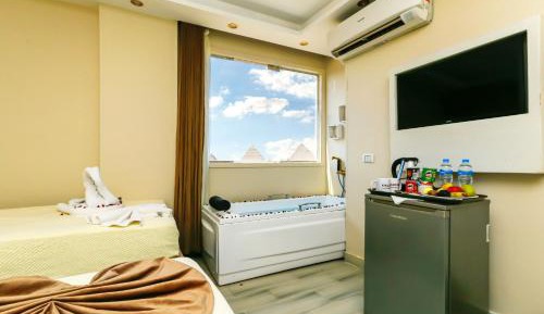 King Room with Jacuzzi and Pyramids View