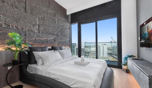 One-Bedroom Apartment with Balcony and City View
