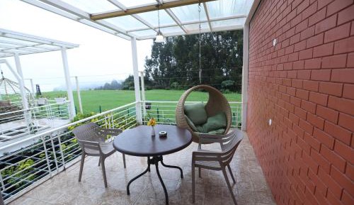 Exotic First Floor Balcony-Swing With Mountain View