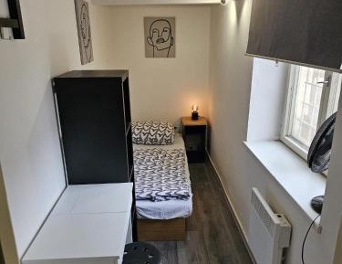 Single Room with Shared Shower and Toilet